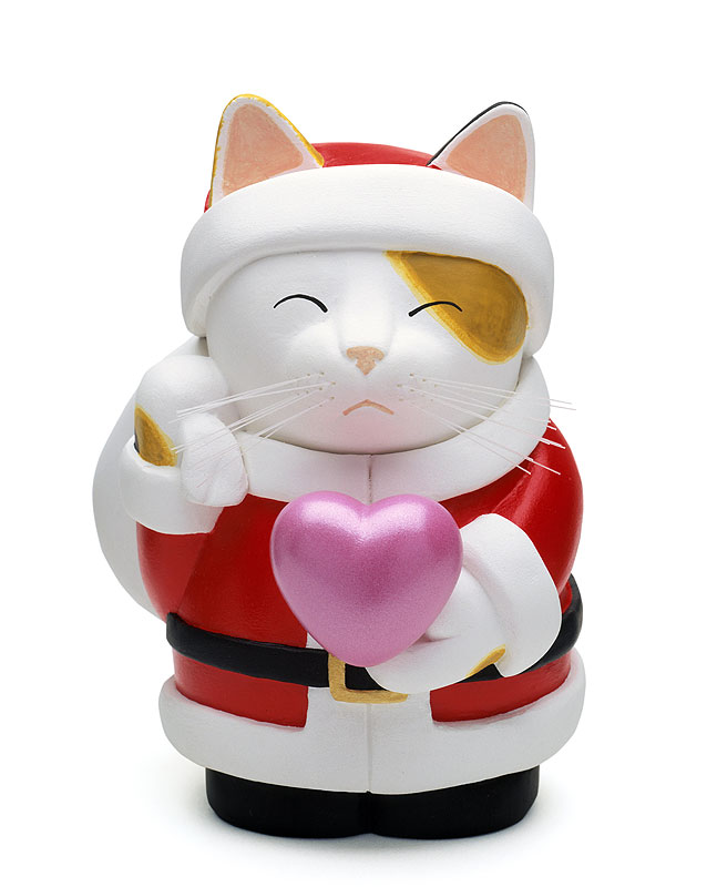 クリスマスのサンタクロースイラスト　ハートを持ったネコがサンタクロースの衣装を着てプレゼントのクリスマスイラスト
