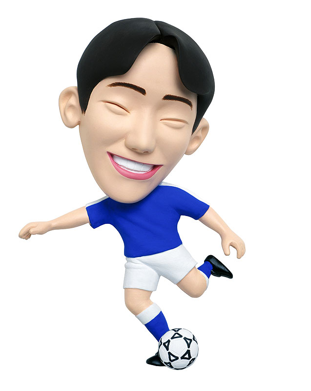 サッカーストライカーイラスト フリーキックする笑顔のサッカー選手のサッカーストライカーイラスト